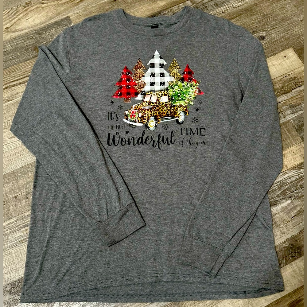 Long sleeve gray holiday t shirt. Never worn. Excellent condition. Size XL